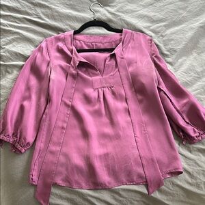 Women’s size 6 blouse with neck tie, very elegant for work.